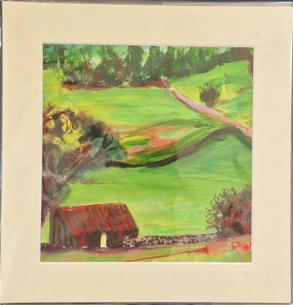 Red Roof original mixed media landscape by Sue Dewhurst showing a corrugated iron-roofed farm shelter, green hills and a winding country track.
