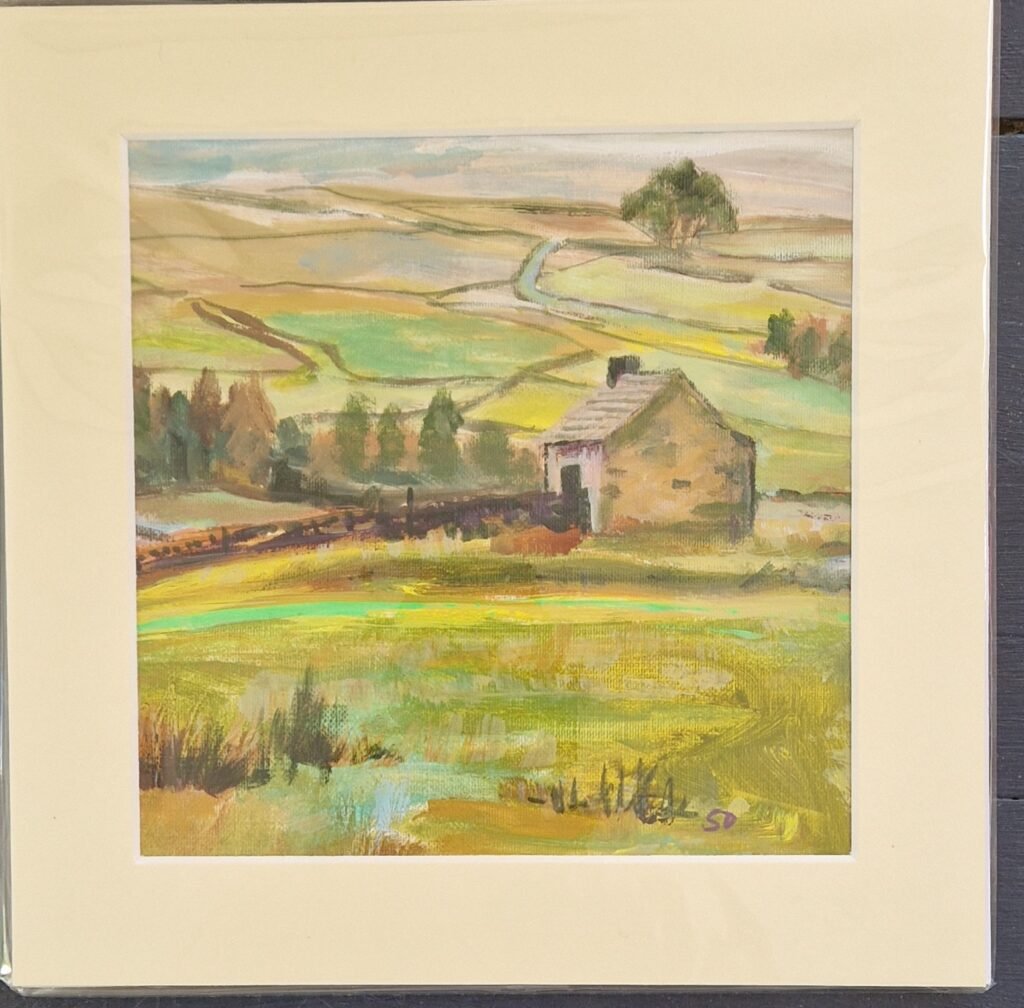 Shepherd's Rest original mixed media moorland landscape by Sue Dewhurst, featuring a solitary stone barn among rolling fields.