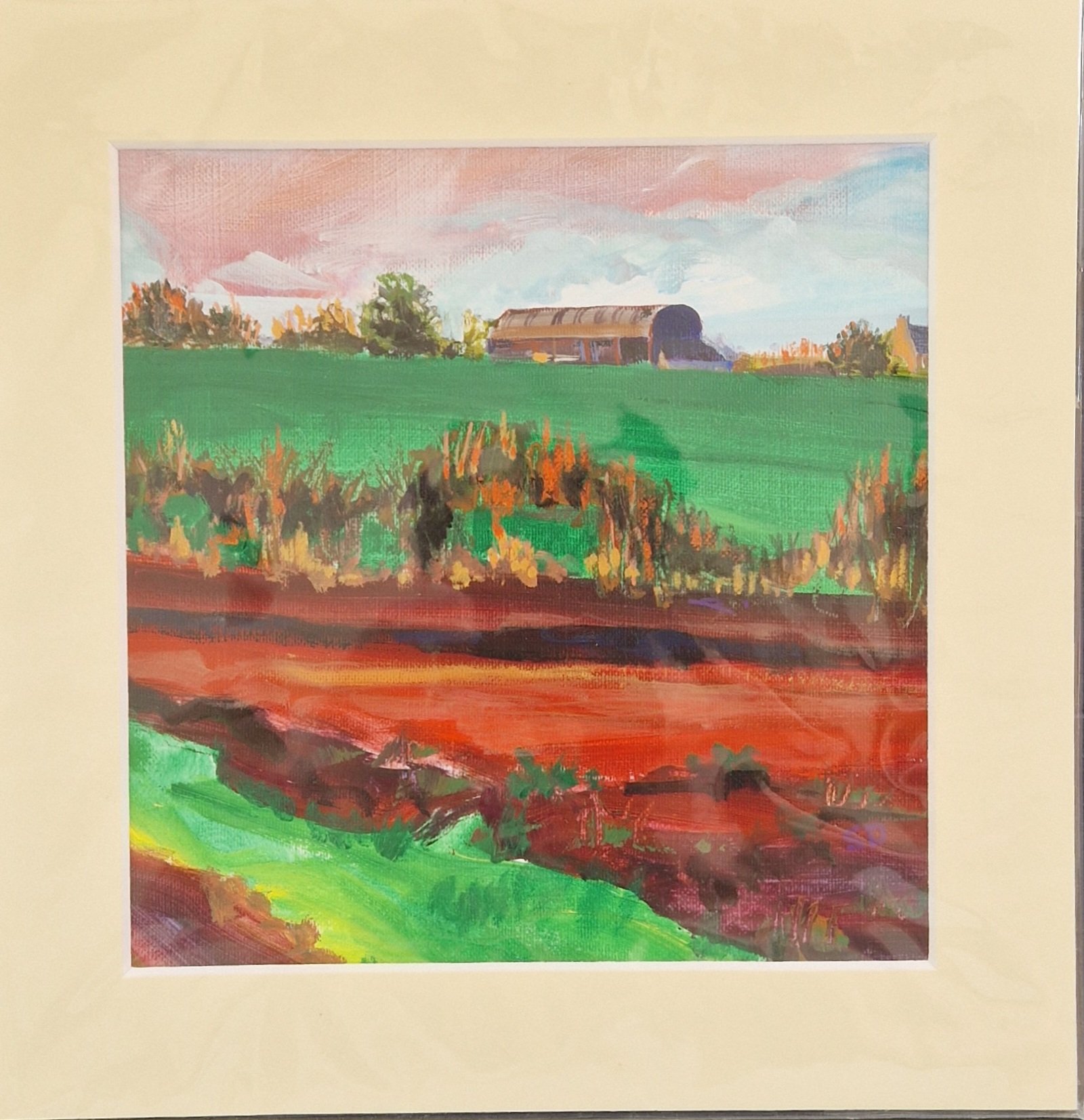 Barn with Red Field original mixed media painting by Sue Dewhurst featuring a curved-roof farm barn, bright green fields and rich red foreground.