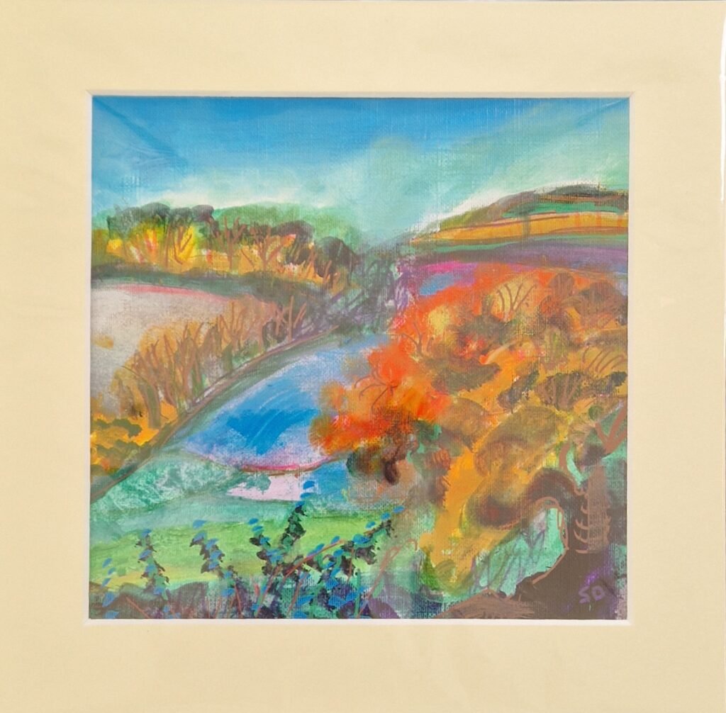 Fire Tree original mixed media landscape by Sue Dewhurst showing vivid orange autumn foliage among rolling green hills and sweeping blue countryside.